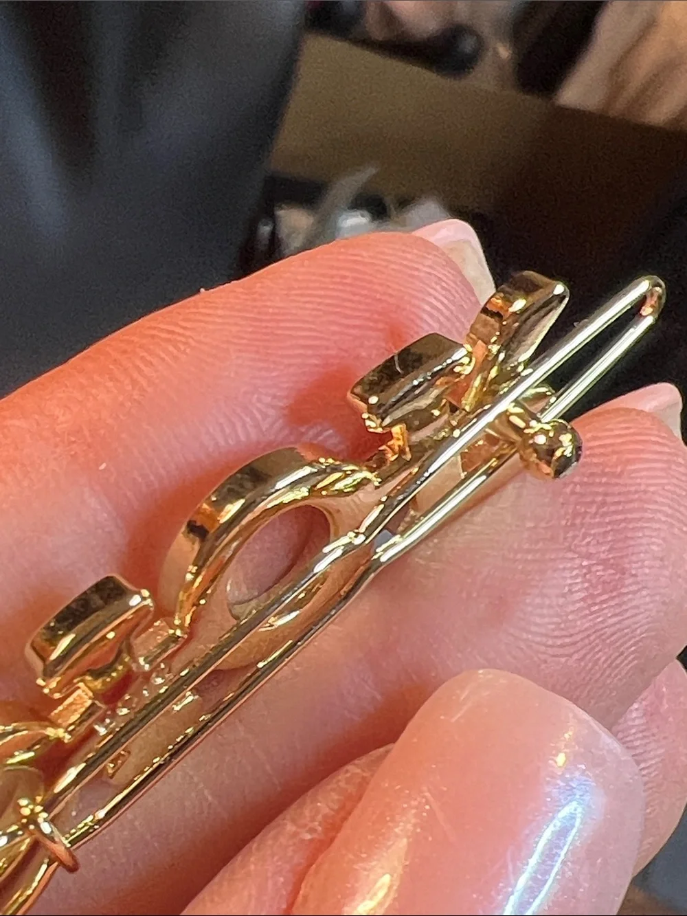 Black and Gold Logo Pin